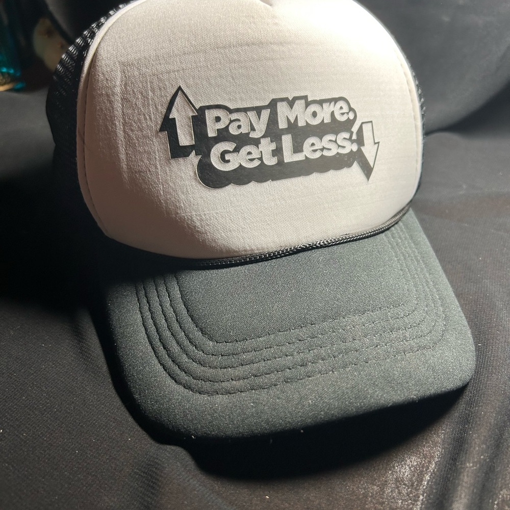 Black and White Trucker Hat with Bold Statement. Unbranded